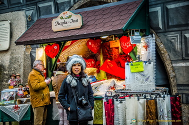 Christmas market stall selling Christmas napery